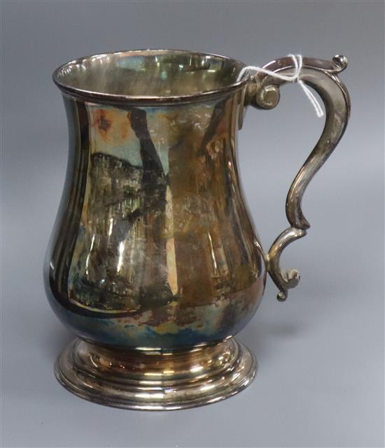 A late Victorian silver baluster-shaped mug, by Martin, Hall & Co, London 1892, 9.5 oz.